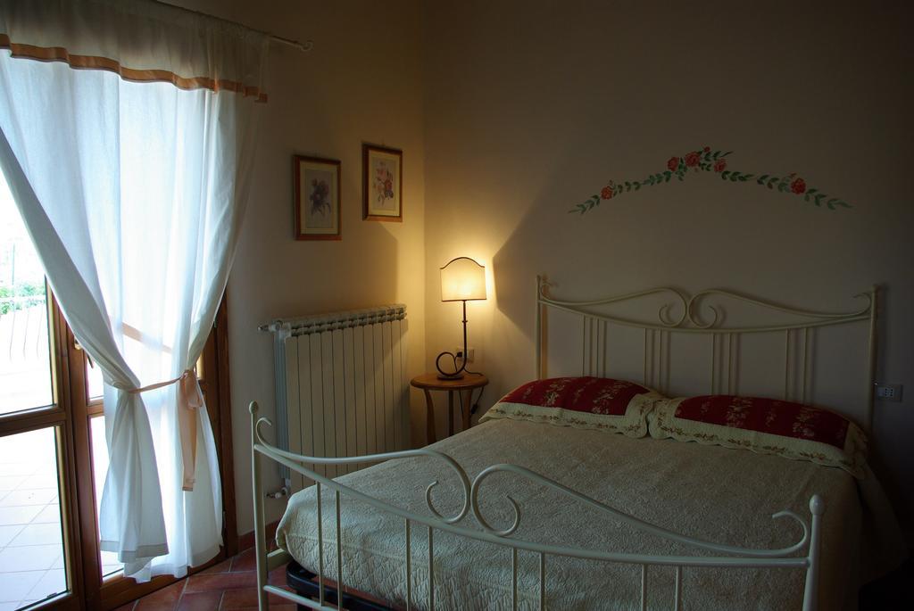 Апартаменты Il Gufo Del Chianti Монтеспертоли Номер фото